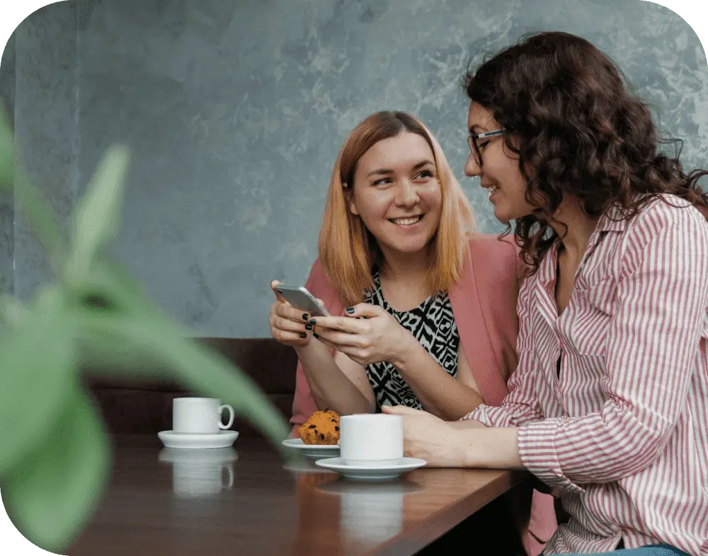 learn to say “thank you” in greek! - women discussing online courses